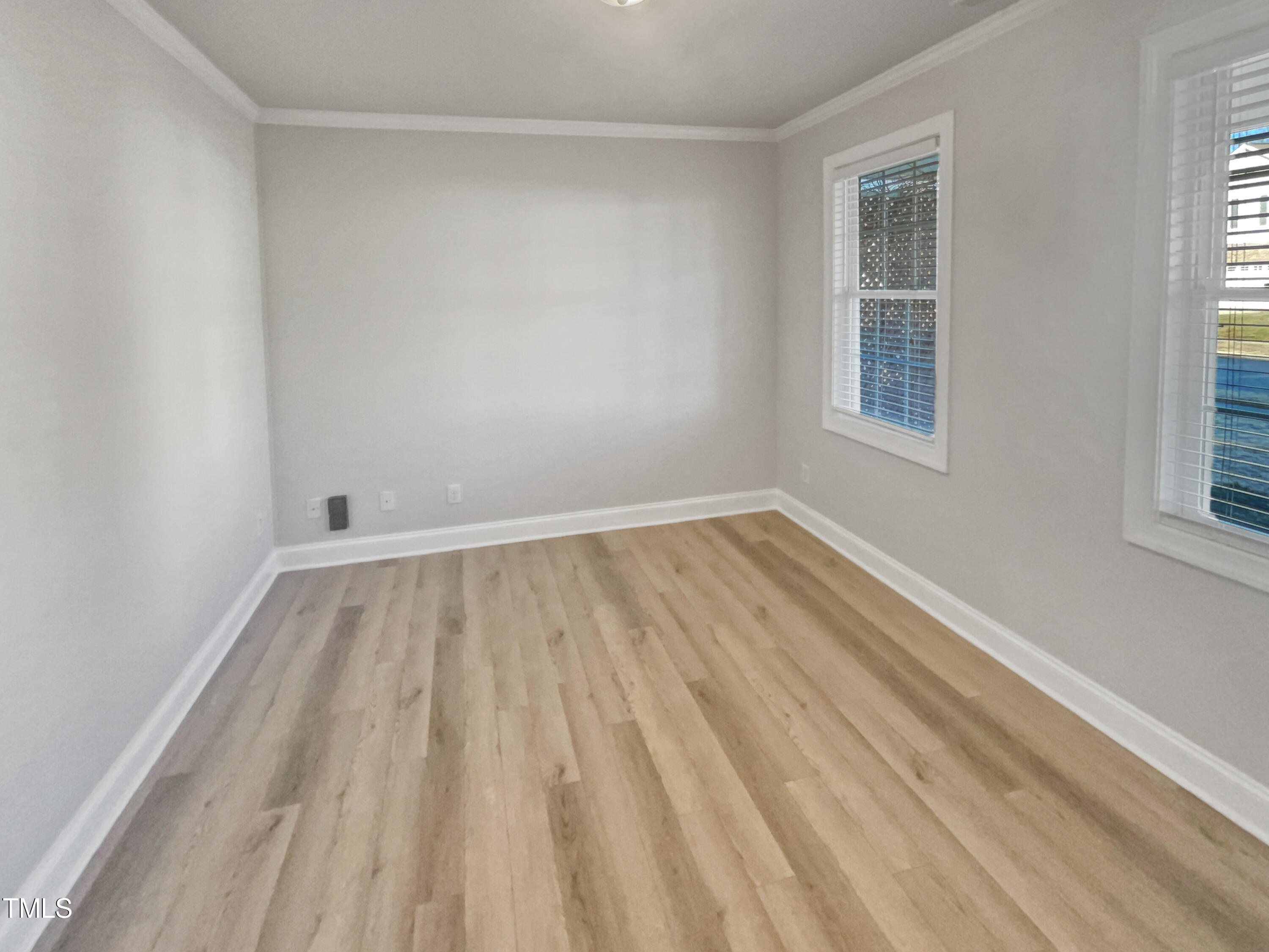 421 Cottesbrook Drive Wake Forest, NC 27587 - Photo 7 of 19 a view of room with window and hardwood floor