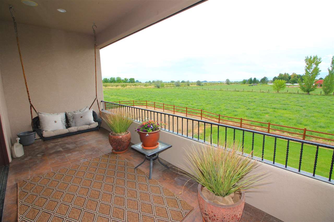 1116 22 Road Grand Junction, CO 81505 - Photo 24 of 42 a view of a two chairs in patio of the house