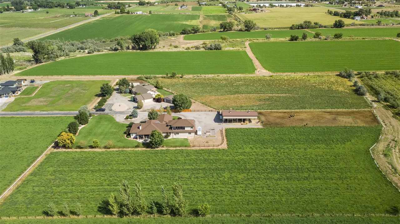 1116 22 Road Grand Junction, CO 81505 - Photo 40 of 42 a view of a golf course with a lake