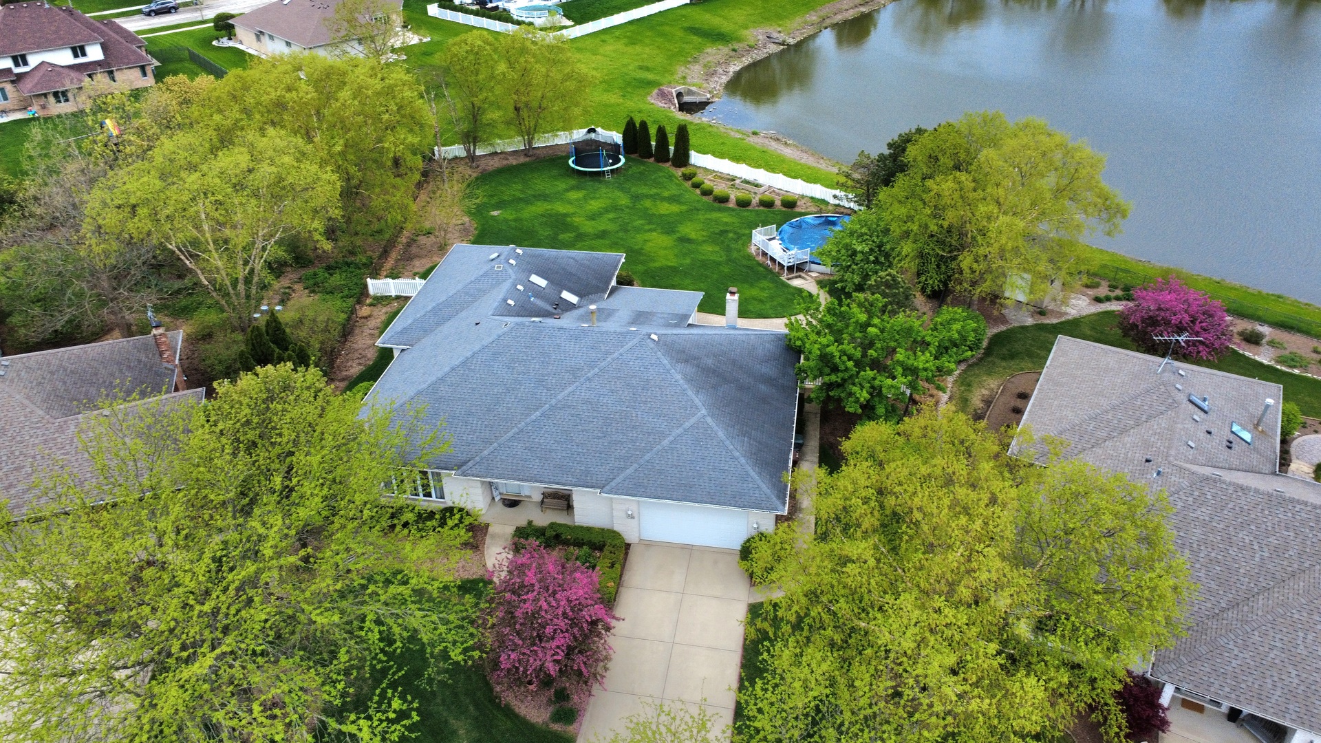 an aerial view of a house with a garden