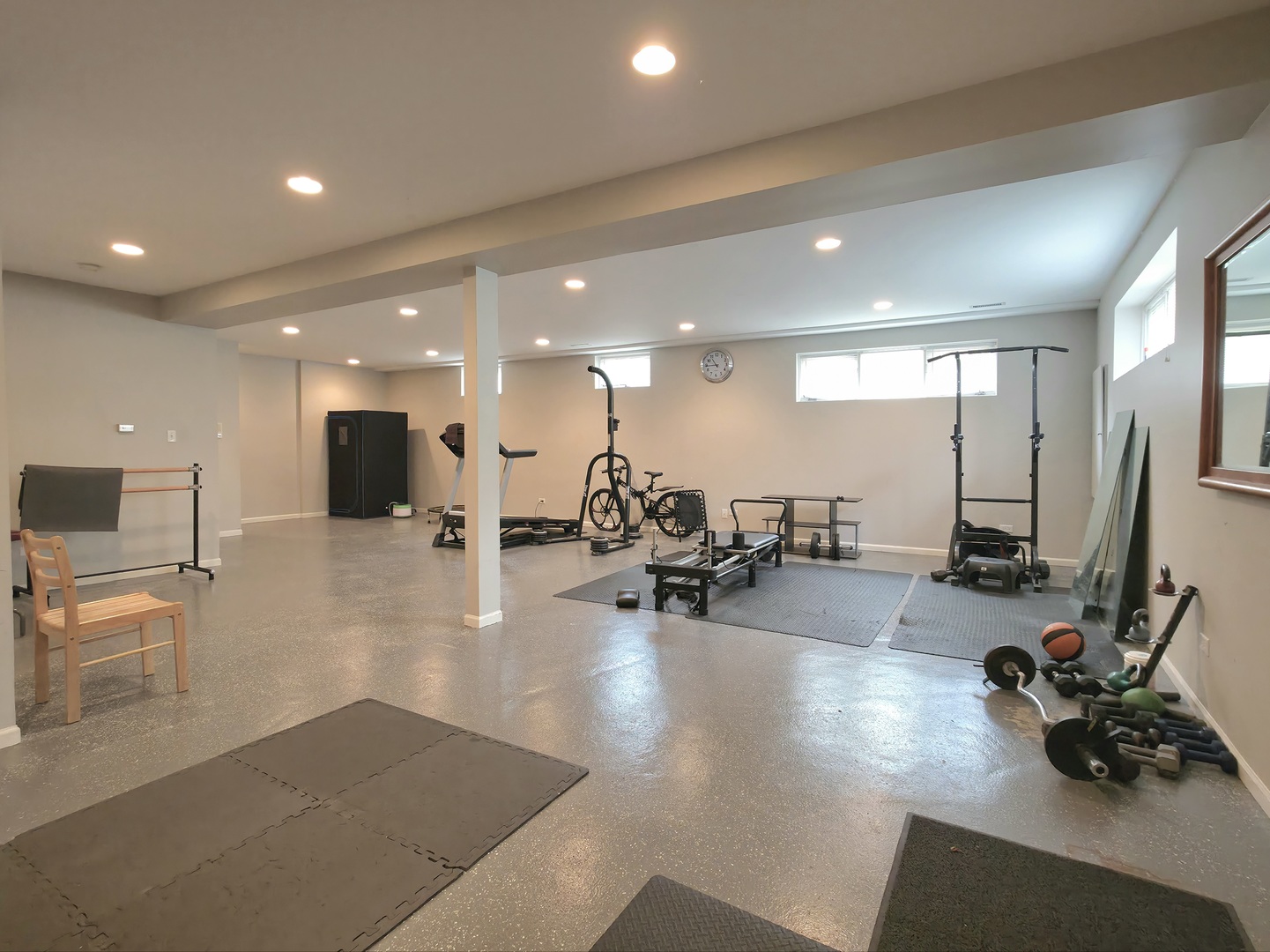 10160 Lancaster Drive Mokena, IL 60448 - Photo 18 of 41 a room with lots of chairs and mirrors