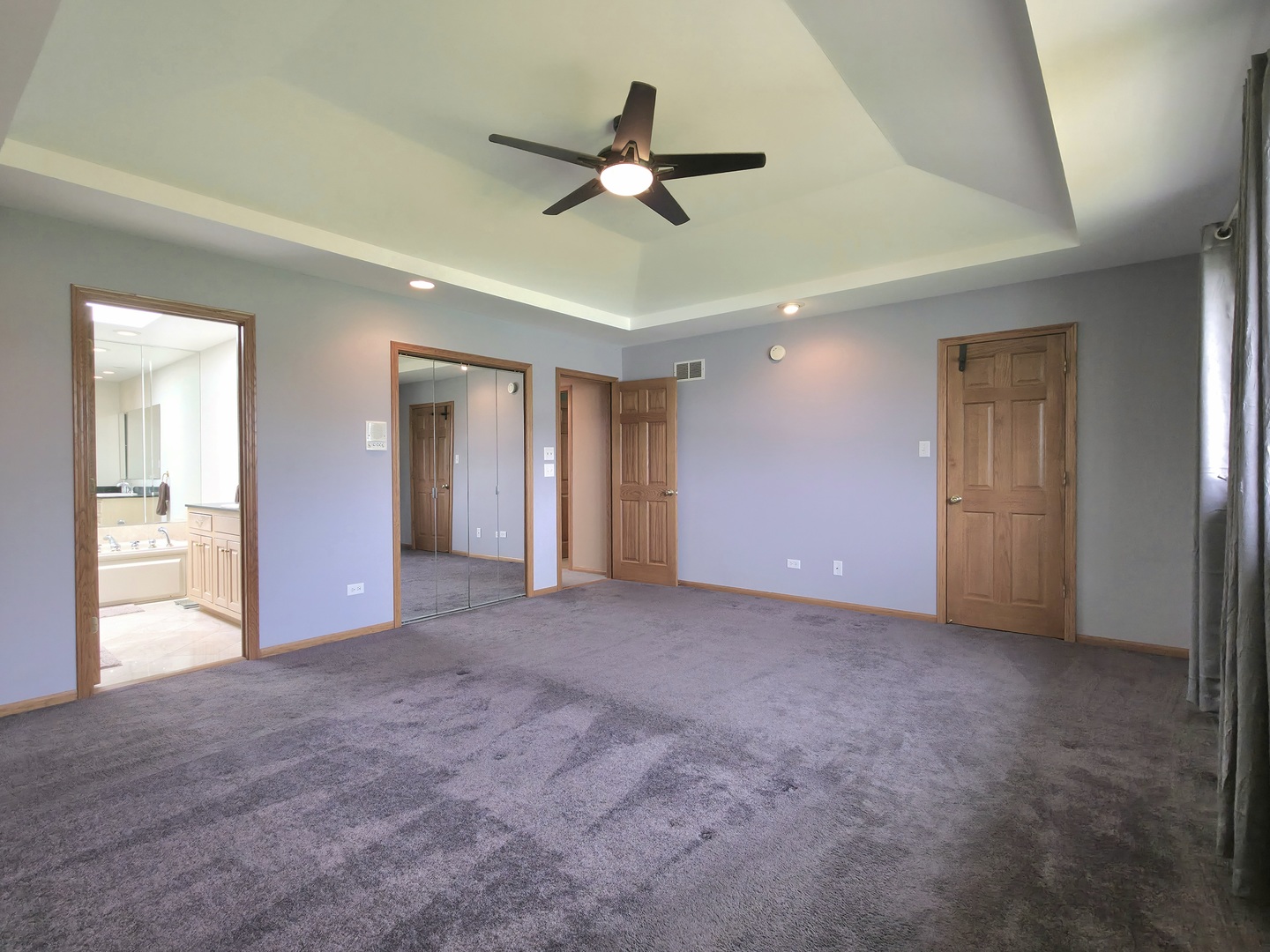 10160 Lancaster Drive Mokena, IL 60448 - Photo 26 of 41 a view of an empty room with window and a kitchen