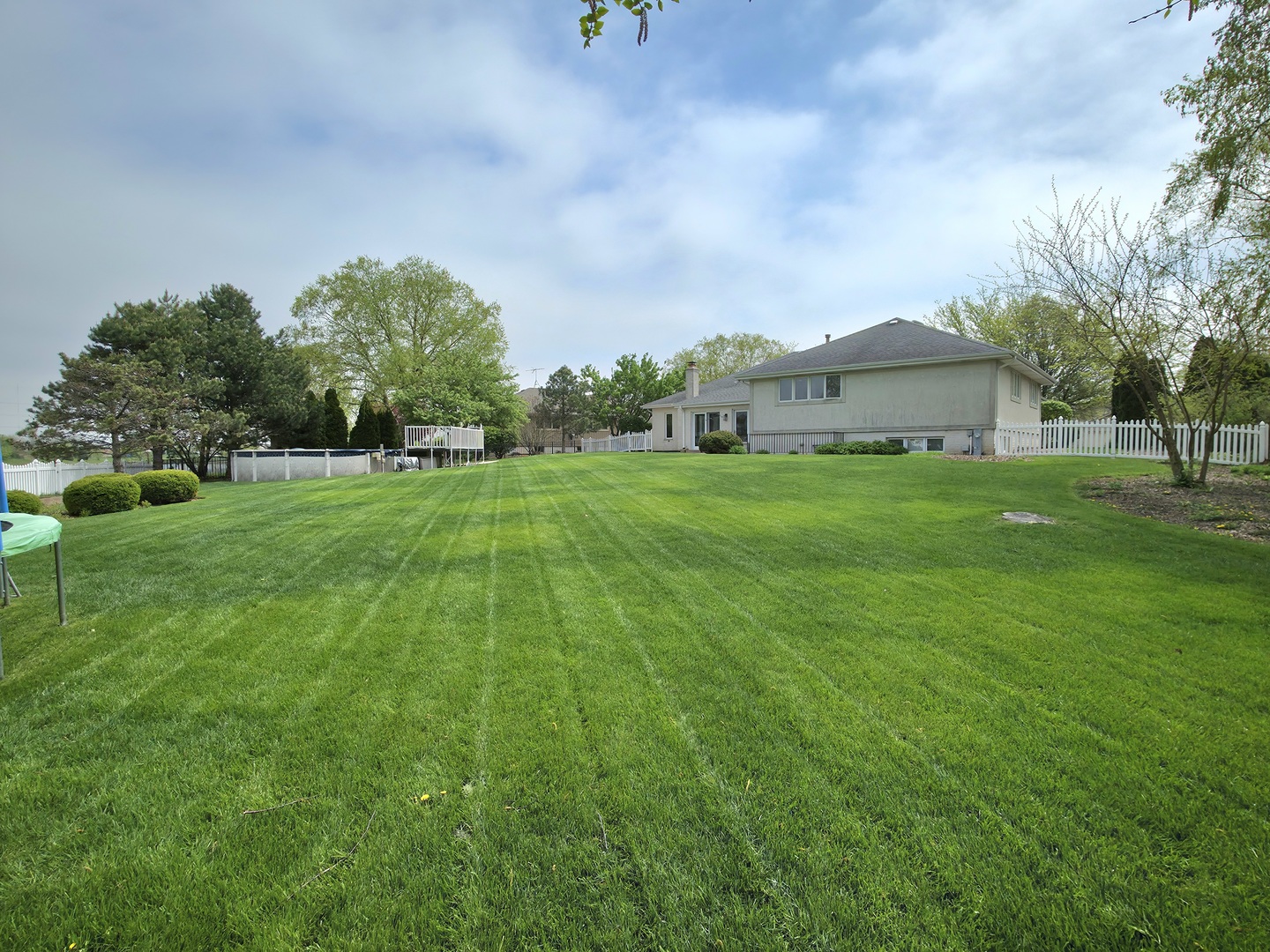 10160 Lancaster Drive Mokena, IL 60448 - Photo 34 of 41 a view of a big yard with a house in the background
