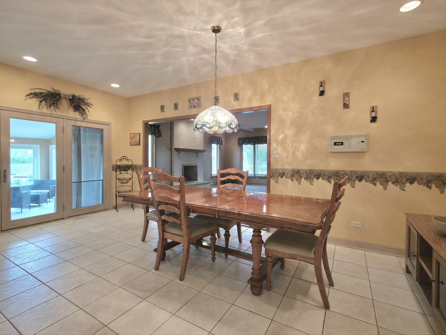 10160 Lancaster Drive Mokena, IL 60448 - Photo 8 of 41 a view of a dining room with furniture and chandelier