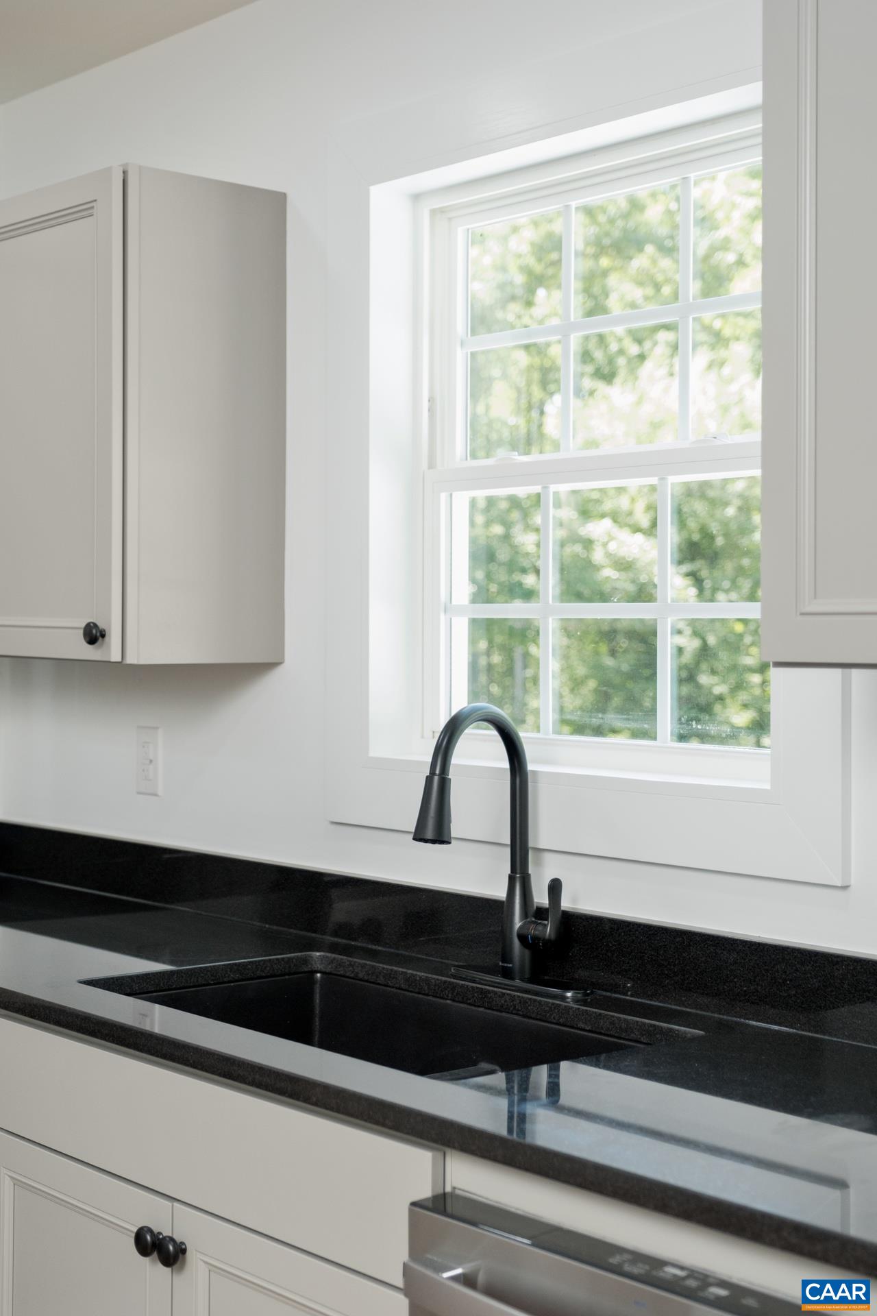 2211 Carpenters Mill Road Ruckersville, VA 22968 - Photo 13 of 25 a view of a sink and cabinets in kitchen