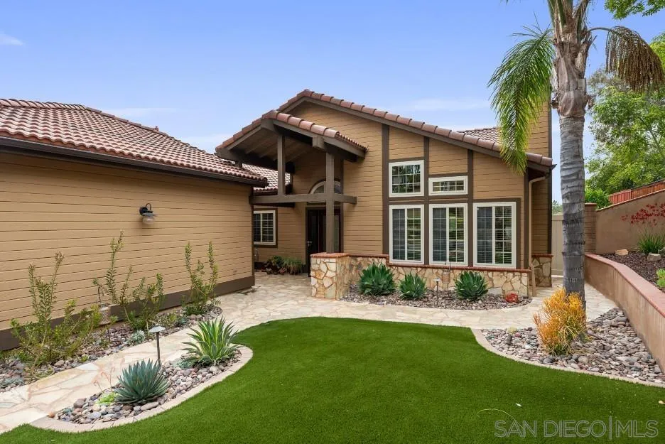 14420 Silver Heights Road Poway, CA 92064 - Photo 20 of 73 a view of a house with a yard patio and swimming pool