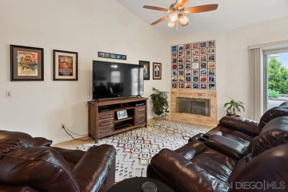 14420 Silver Heights Road Poway, CA 92064 - Photo 42 of 73 a living room with furniture and a flat screen tv