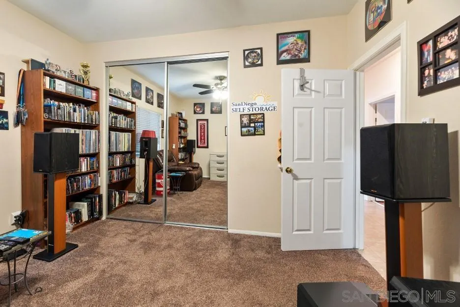 14420 Silver Heights Road Poway, CA 92064 - Photo 56 of 73 a view of a livingroom with shelves