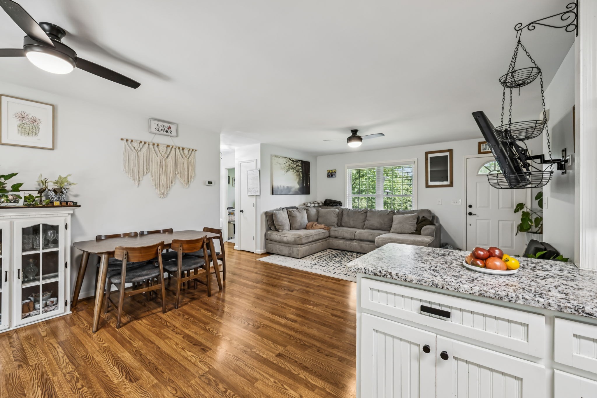 4951 Weakley Creek Road Lawrenceburg, TN 38464 - Photo 18 of 75 a living room with furniture a dining table and wooden floor