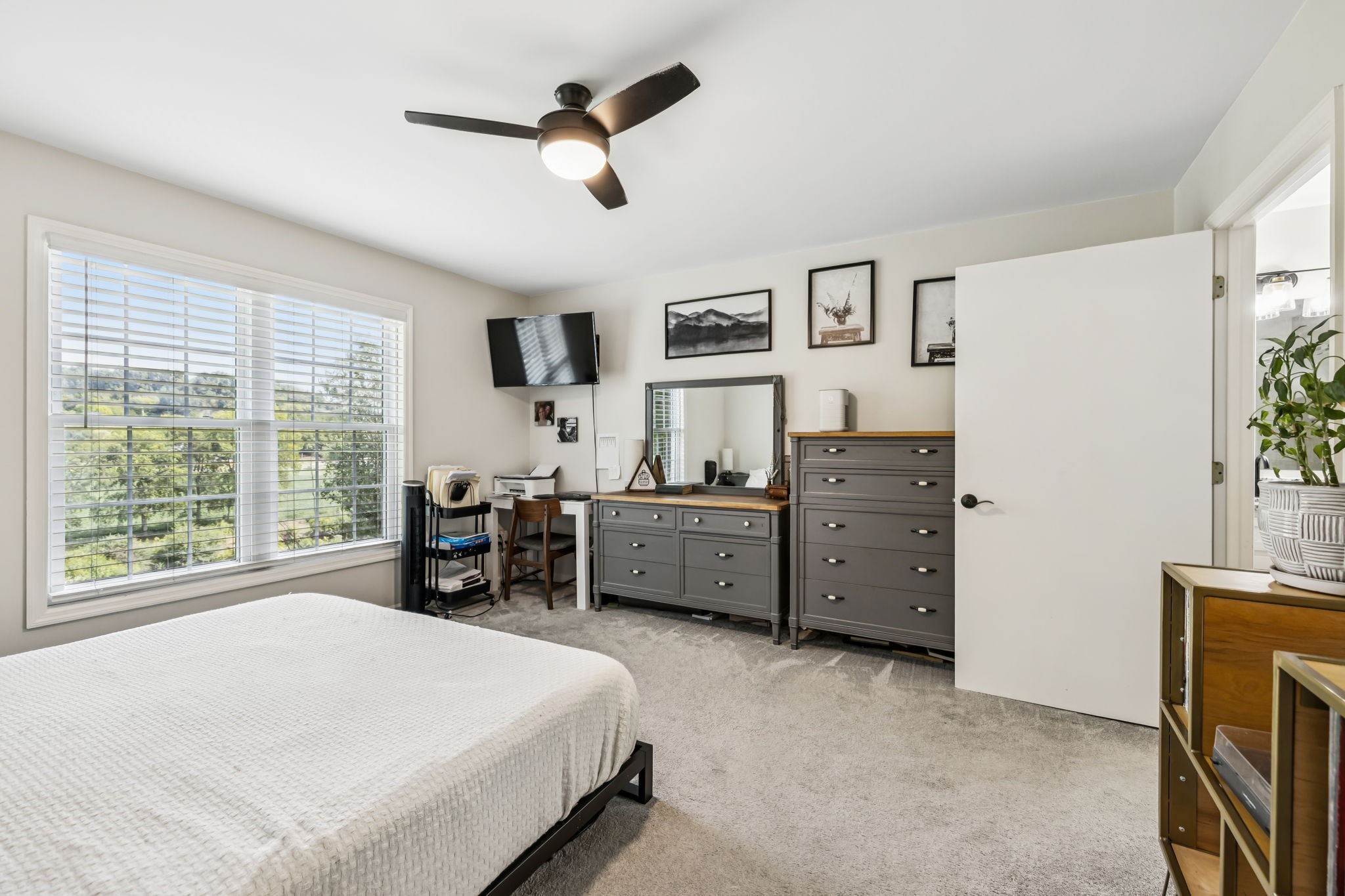4951 Weakley Creek Road Lawrenceburg, TN 38464 - Photo 19 of 75 a bedroom with a bed dresser and a large window