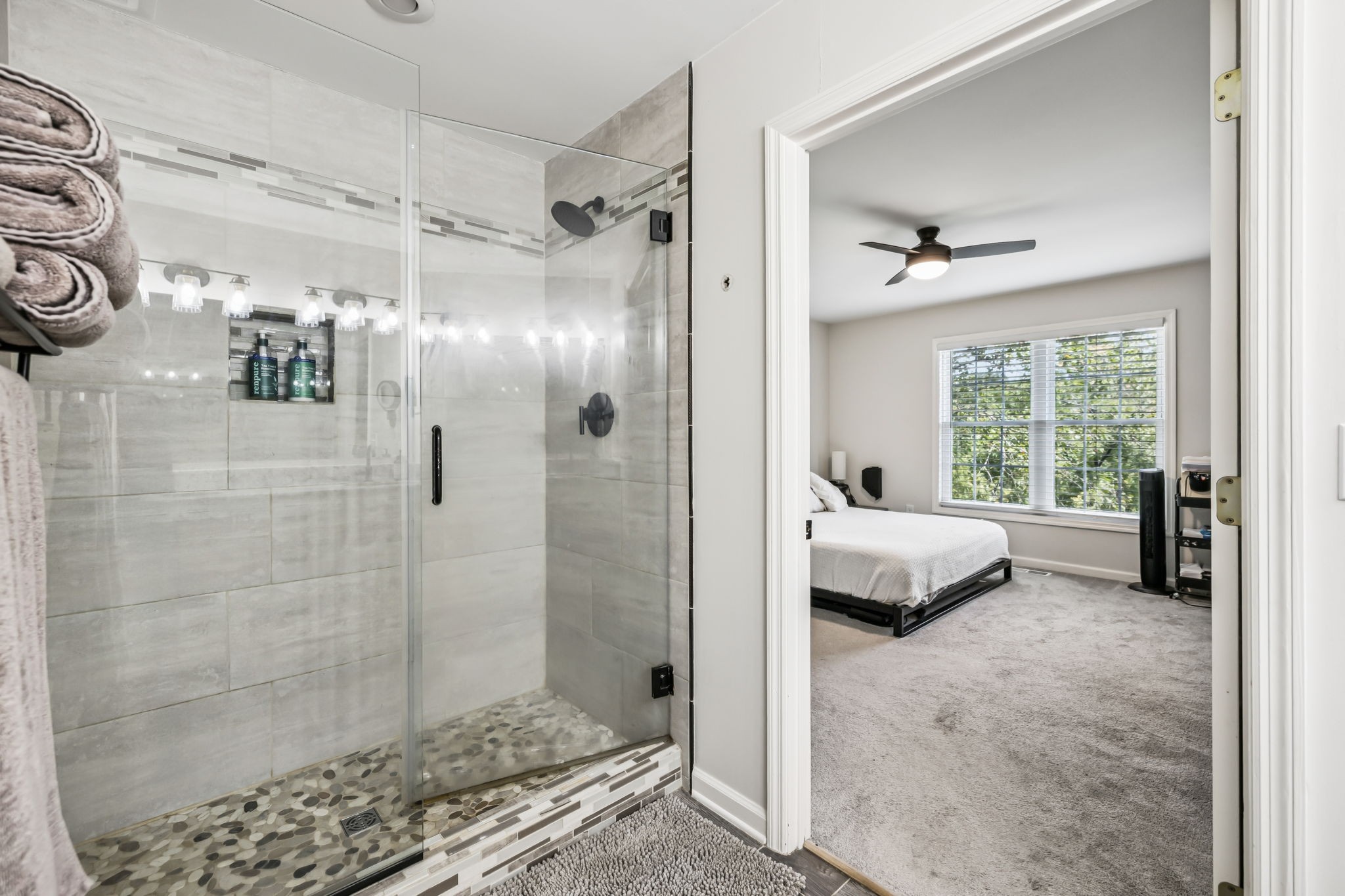 4951 Weakley Creek Road Lawrenceburg, TN 38464 - Photo 23 of 75 a en suite spacious bathroom with a granite countertop double vanity and a shower