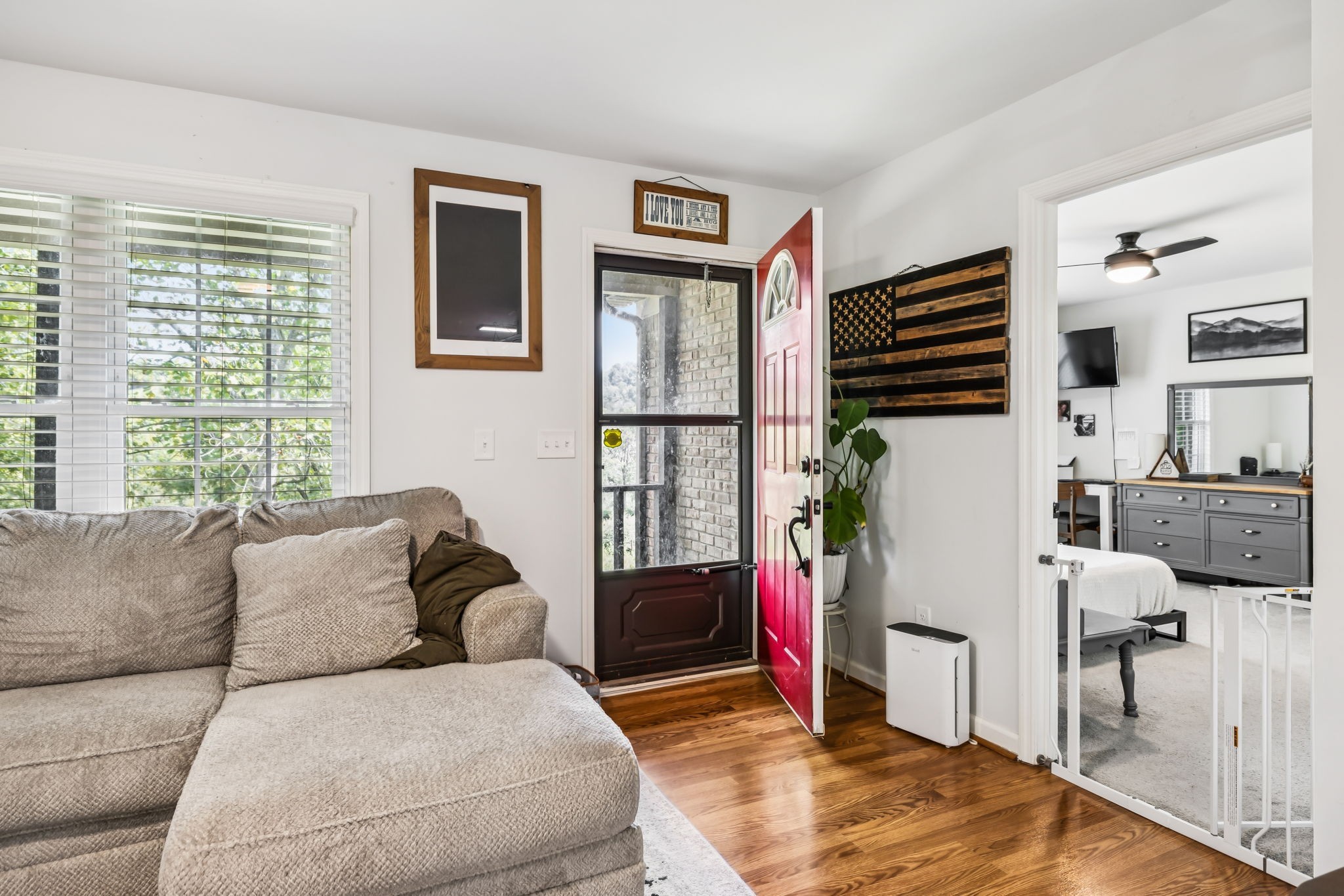 4951 Weakley Creek Road Lawrenceburg, TN 38464 - Photo 29 of 75 a living room with furniture a flat screen tv and a window