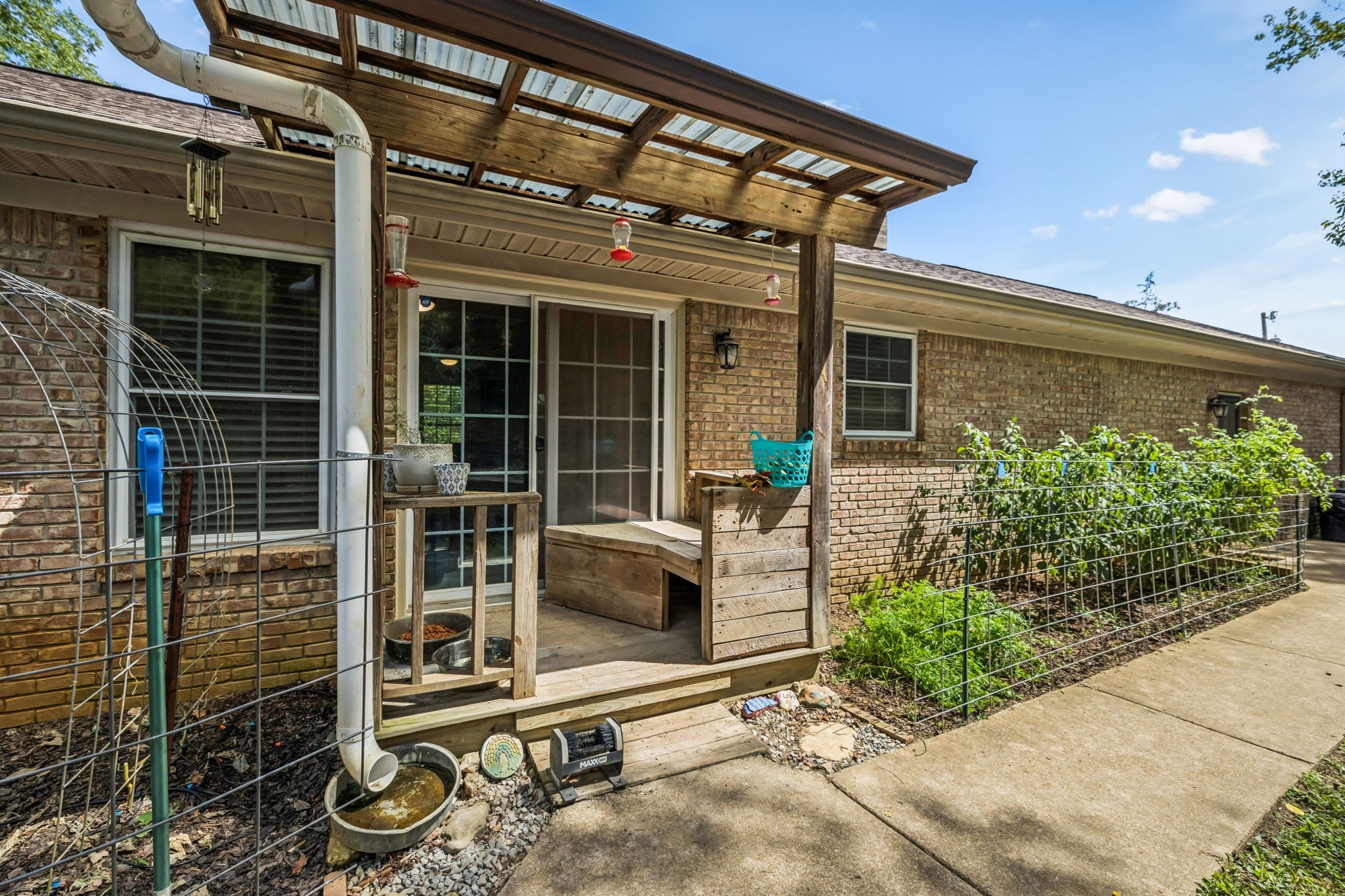 4951 Weakley Creek Road Lawrenceburg, TN 38464 - Photo 36 of 75 front view of a house with potted plants