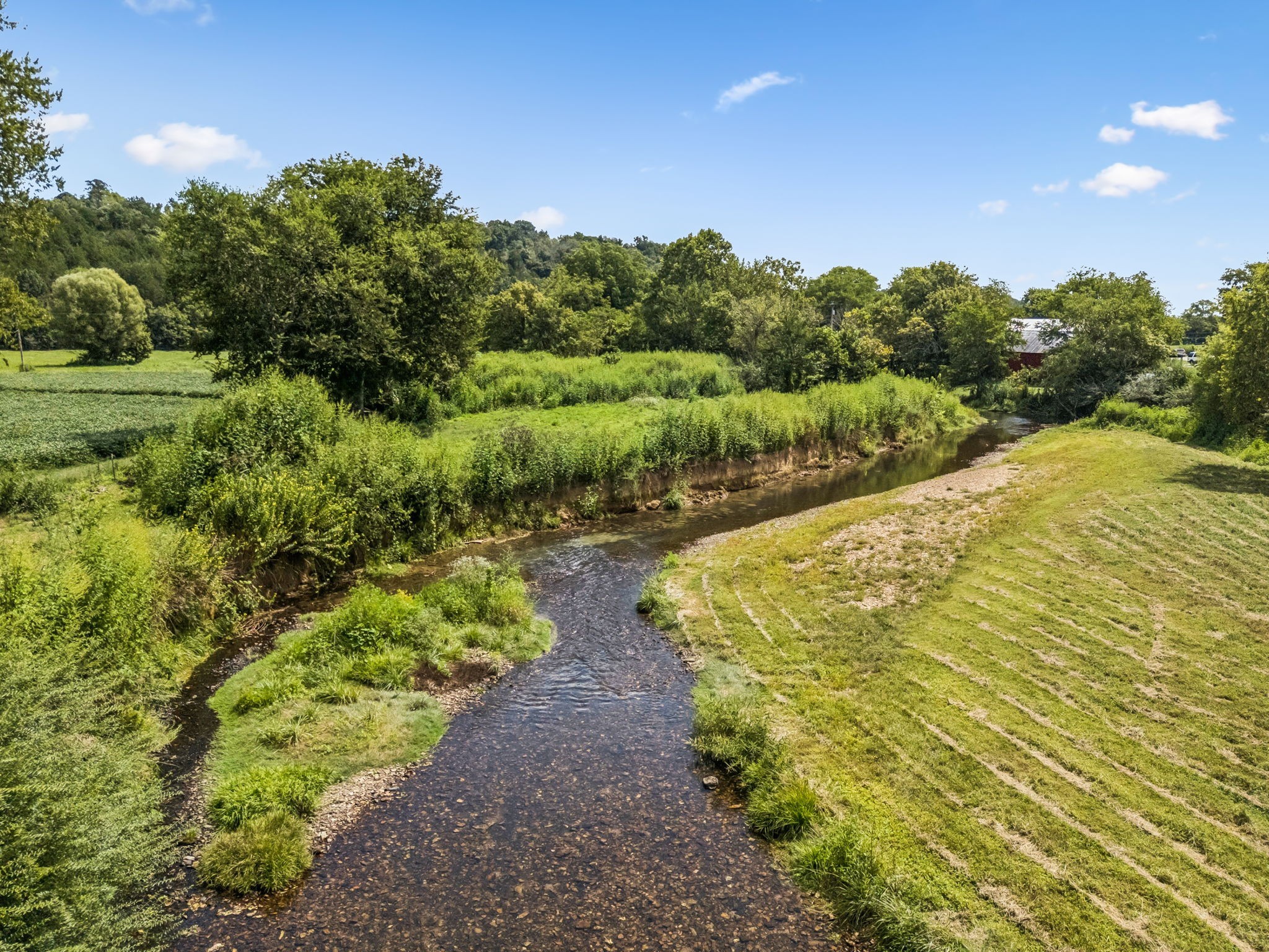 4951 Weakley Creek Road Lawrenceburg, TN 38464 - Photo 4 of 75 a view of a lake with a yard