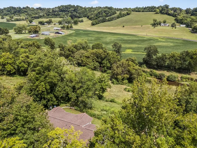 a view of a lake with a yard