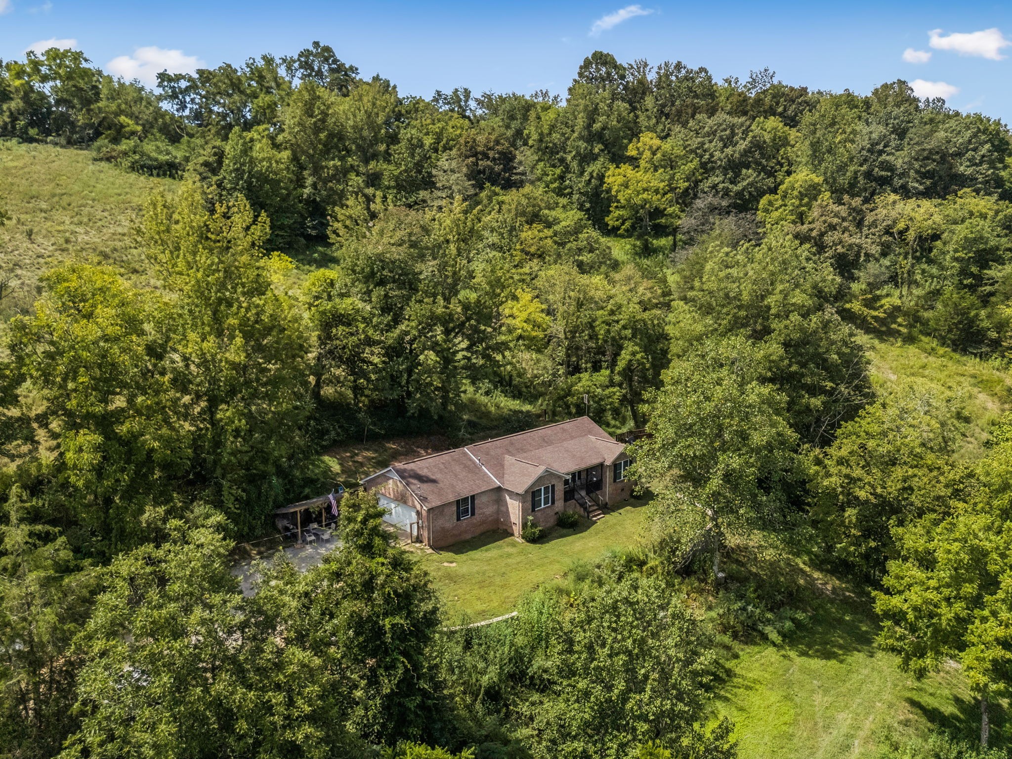 4951 Weakley Creek Road Lawrenceburg, TN 38464 - Photo 46 of 75 an aerial view of a house with yard