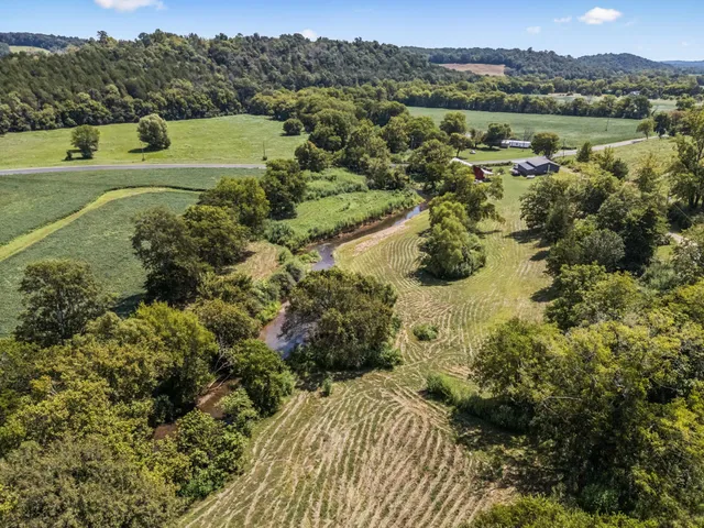 a view of a town with mountains in the background