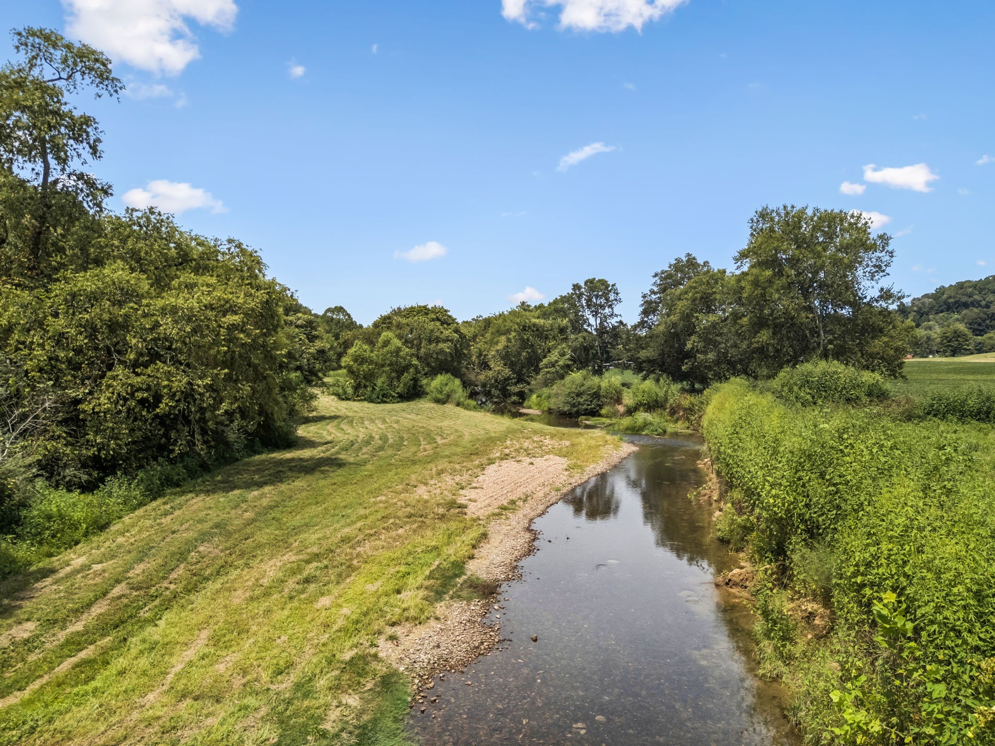 4951 Weakley Creek Road Lawrenceburg, TN 38464 - Photo 63 of 75 a view of a lake with a yard