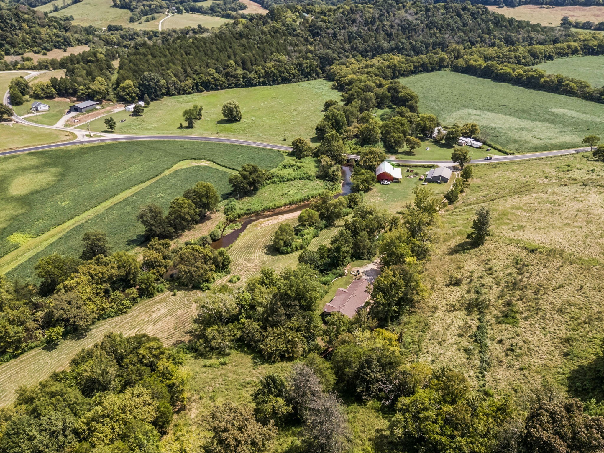 4951 Weakley Creek Road Lawrenceburg, TN 38464 - Photo 72 of 75 an aerial view of a house with a yard and lake view
