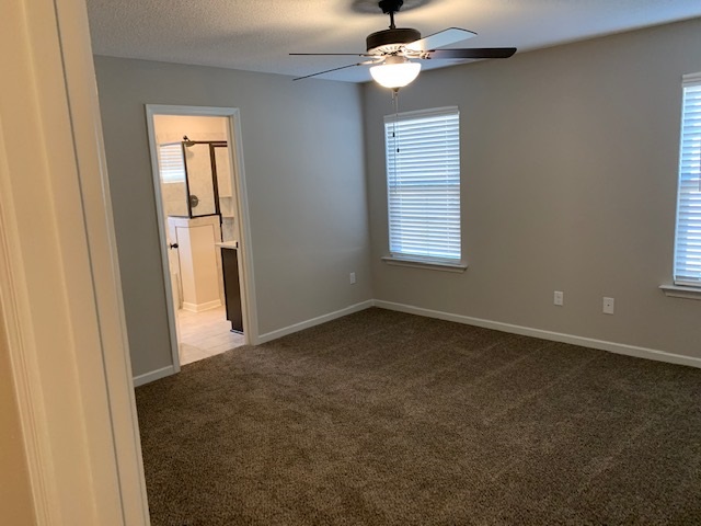 1065 Carib Loop East Cordova, TN 38018 - Photo 13 of 16 an empty room with windows and fan