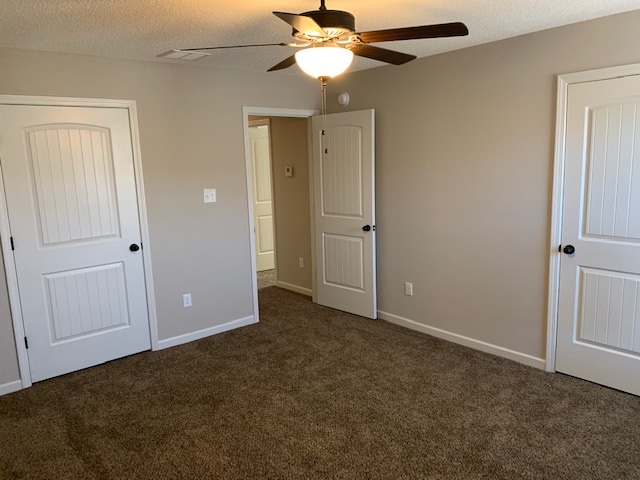 1065 Carib Loop East Cordova, TN 38018 - Photo 7 of 16 an empty room with closet and a chandelier fan