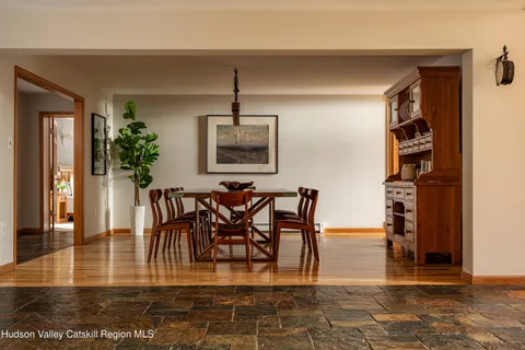 a view of a dining room with furniture