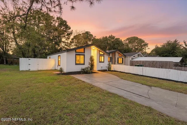a house view with a garden space