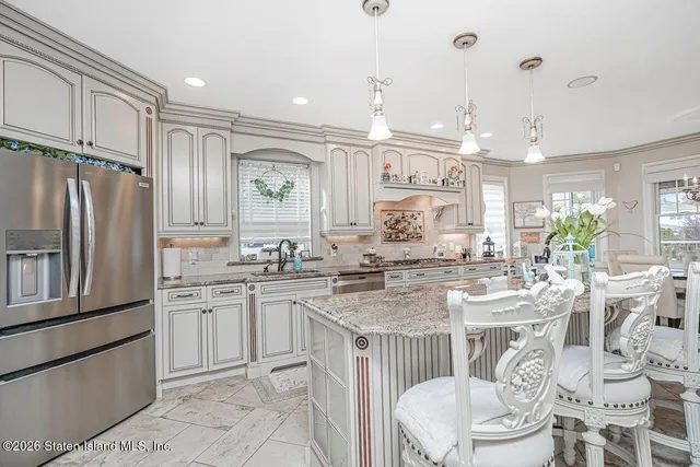 a view of a dining room kitchen and a window