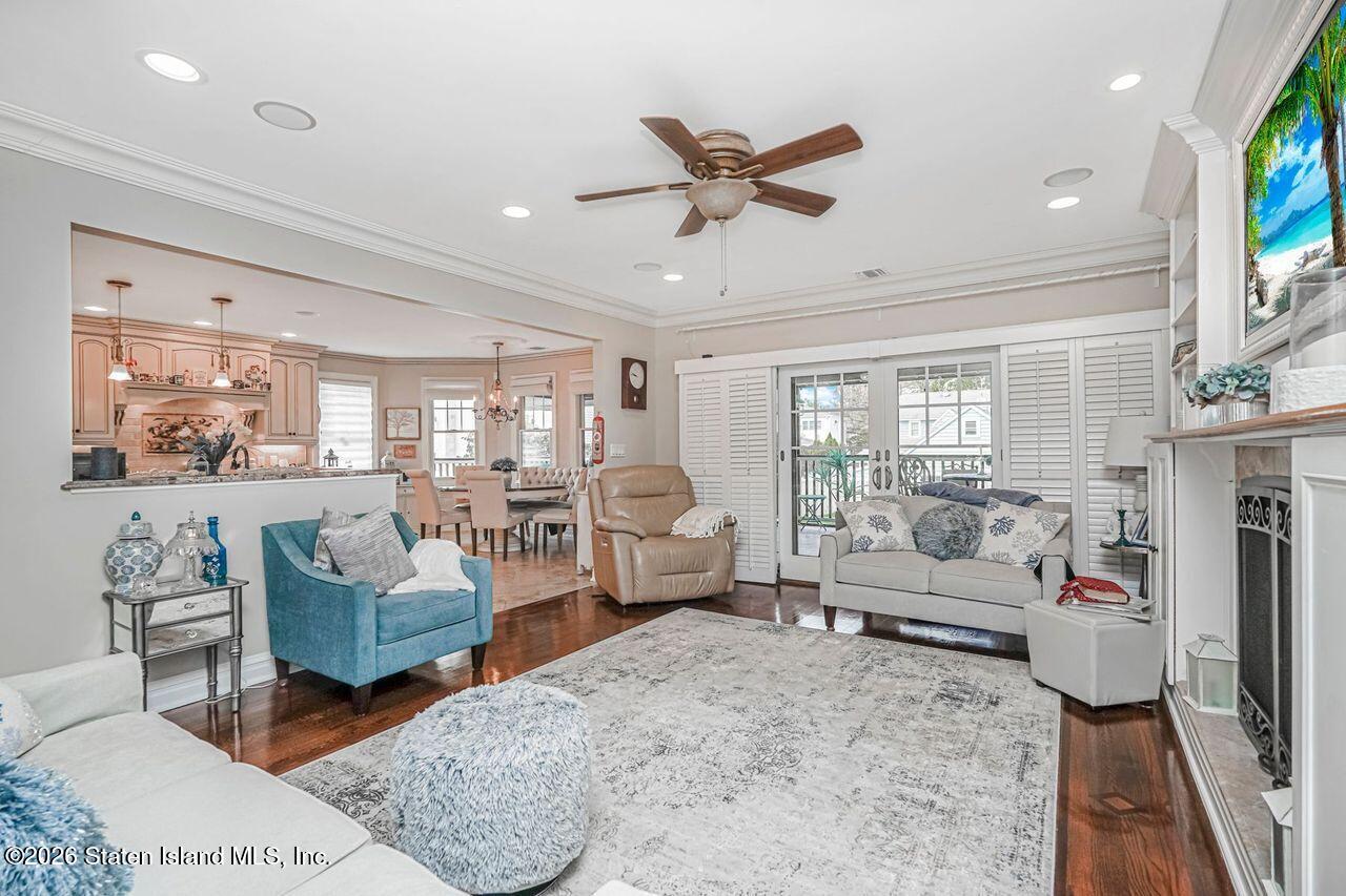 63 Finlay Avenue Staten Island, NY 10309 - Photo 21 of 44 a living room with furniture and a large window