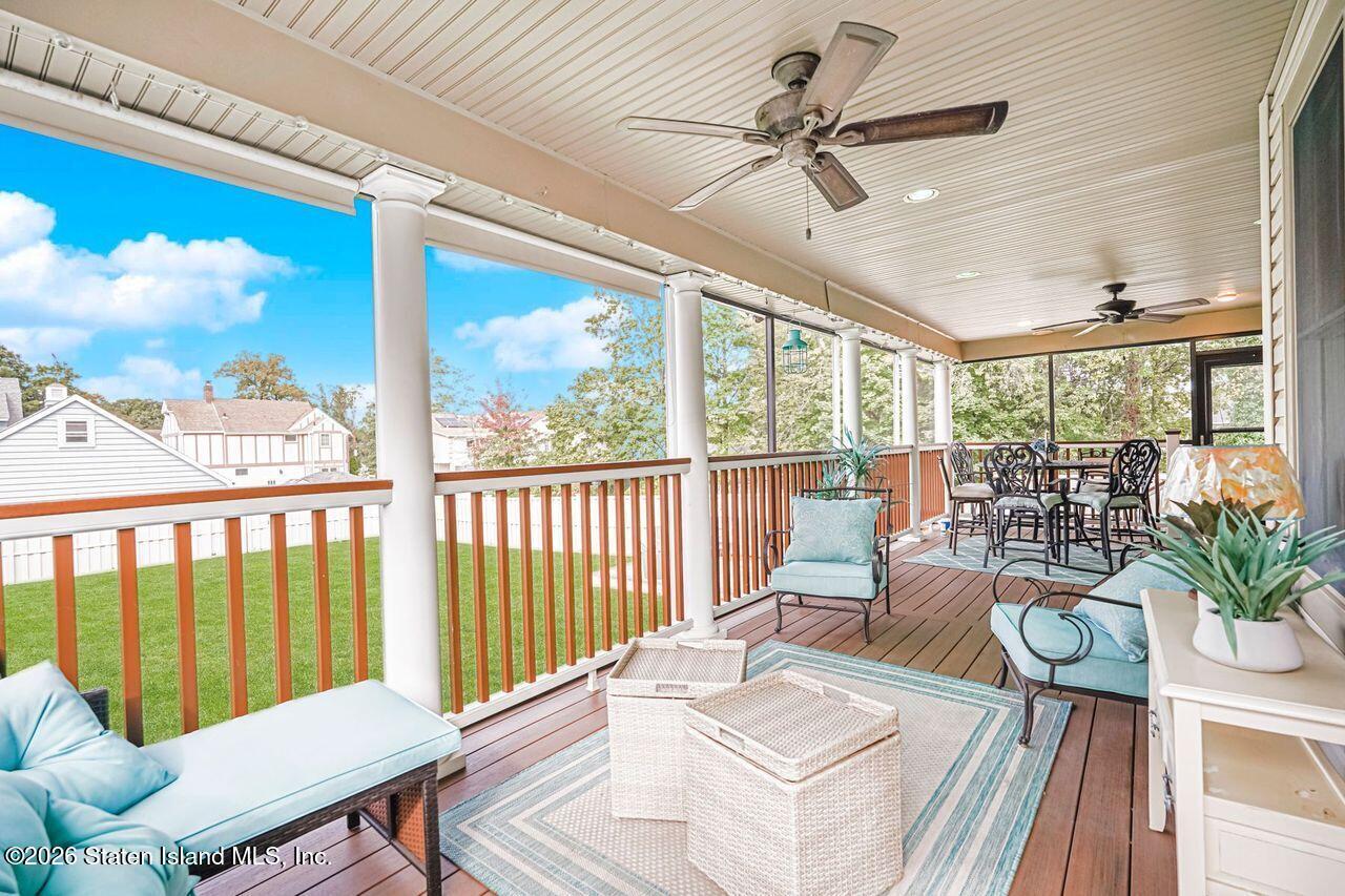 63 Finlay Avenue Staten Island, NY 10309 - Photo 24 of 44 a living room with furniture tv and a large window