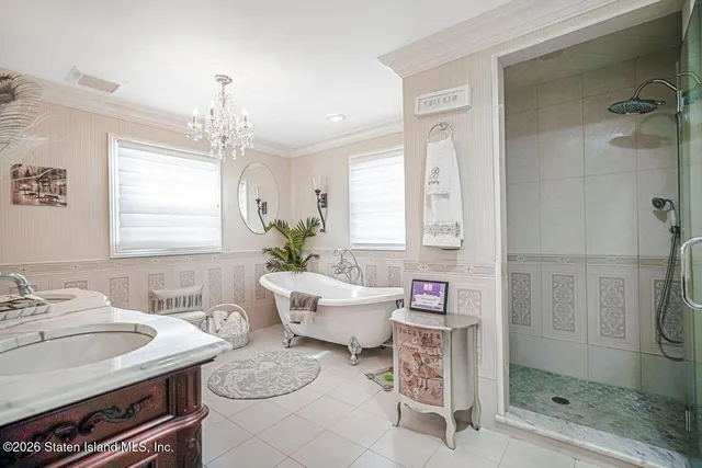 a spacious bathroom with a granite countertop sink and a mirror