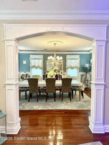 a view of living room with furniture and window