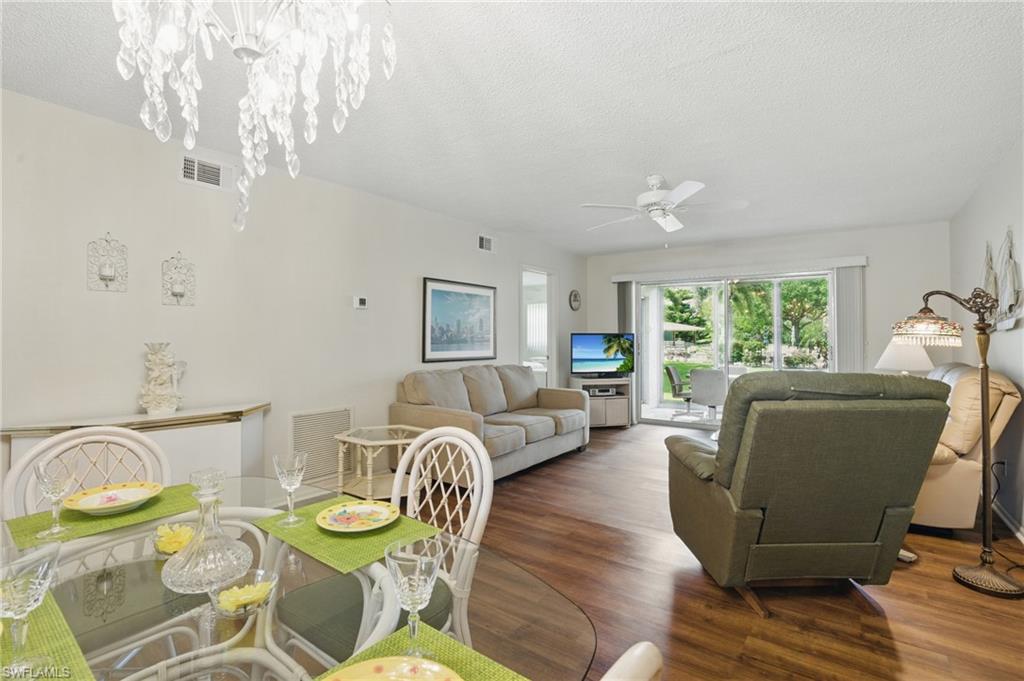 5467 Rattlesnake Hamm Road, Unit C105 Naples, FL 34113 - Photo 3 of 14 LIVING - DINING AREA