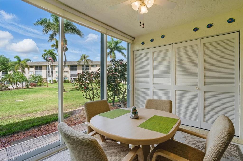 5467 Rattlesnake Hamm Road, Unit C105 Naples, FL 34113 - Photo 6 of 14 REAR LANAI