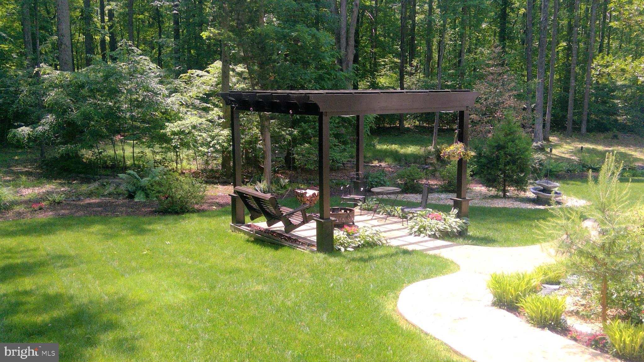 5 Ruffian Drive Stafford, VA 22556 - Photo 8 of 57 Custom Concrete walk way and Pergola!