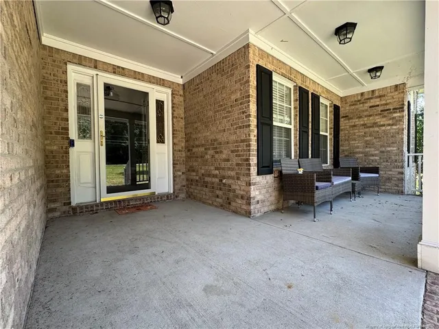 a view of an chairs in the patio
