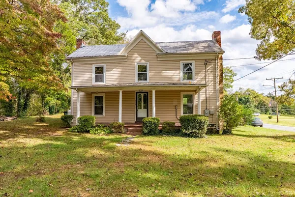 a view of a porch with wooden floor