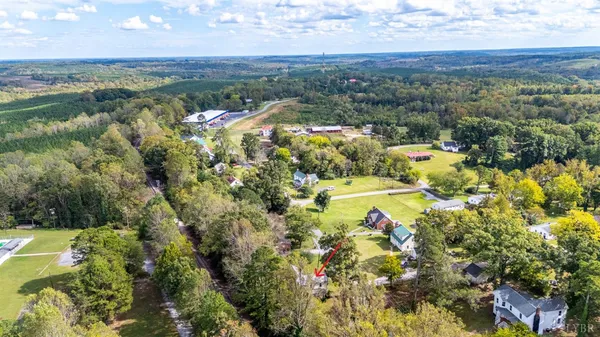 a view of lake with green space