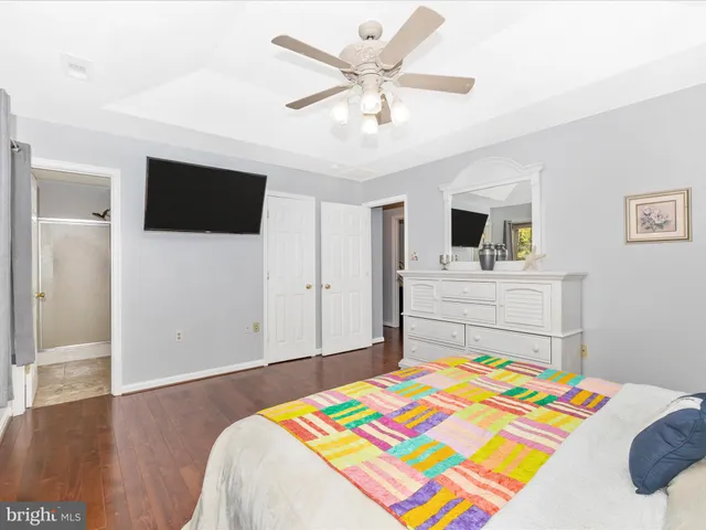 a view of a street with a building in the background