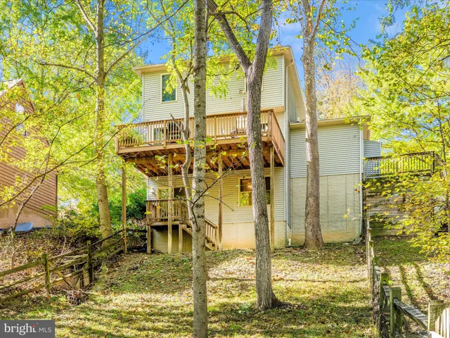 a view of a chairs and table in patio