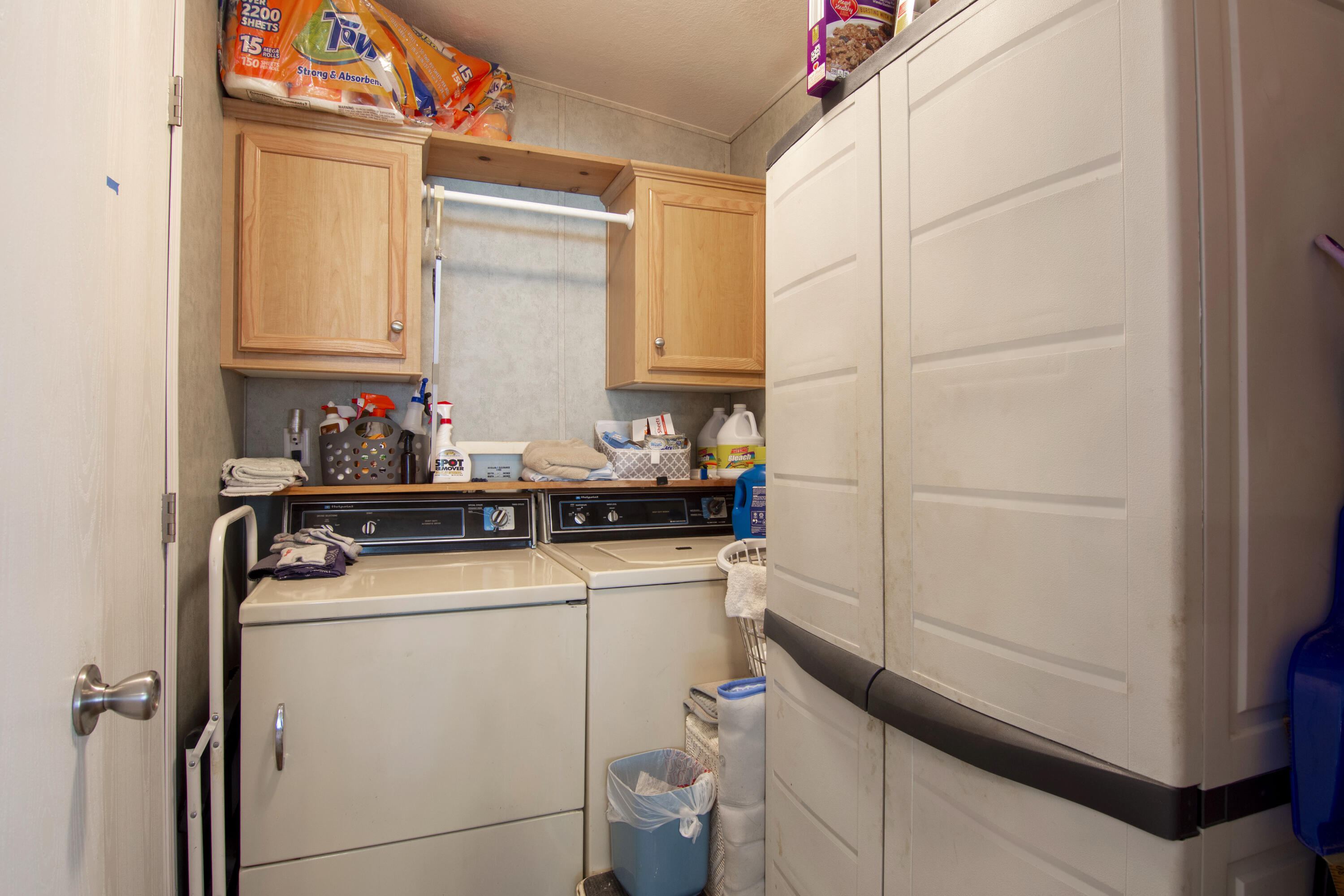 18 Nuevo Leon Road Port St. Lucie, FL 34952 - Photo 22 of 36 a utility room with dryer and washer