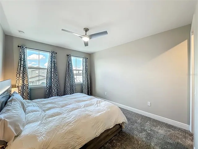 a view of balcony with wooden floor