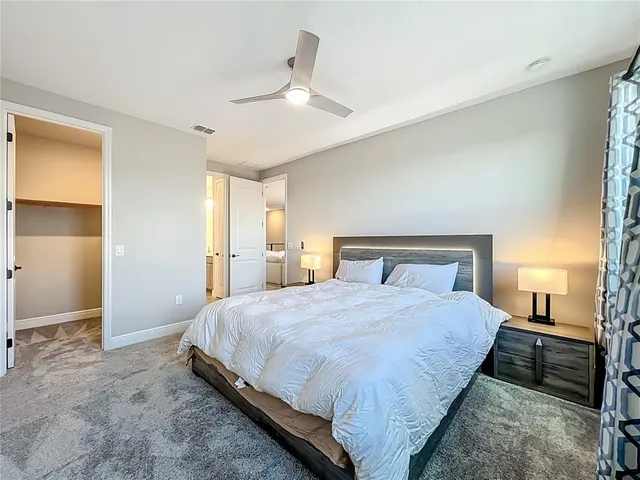 a view of a balcony with floor to ceiling window wooden floor and floor to ceiling window