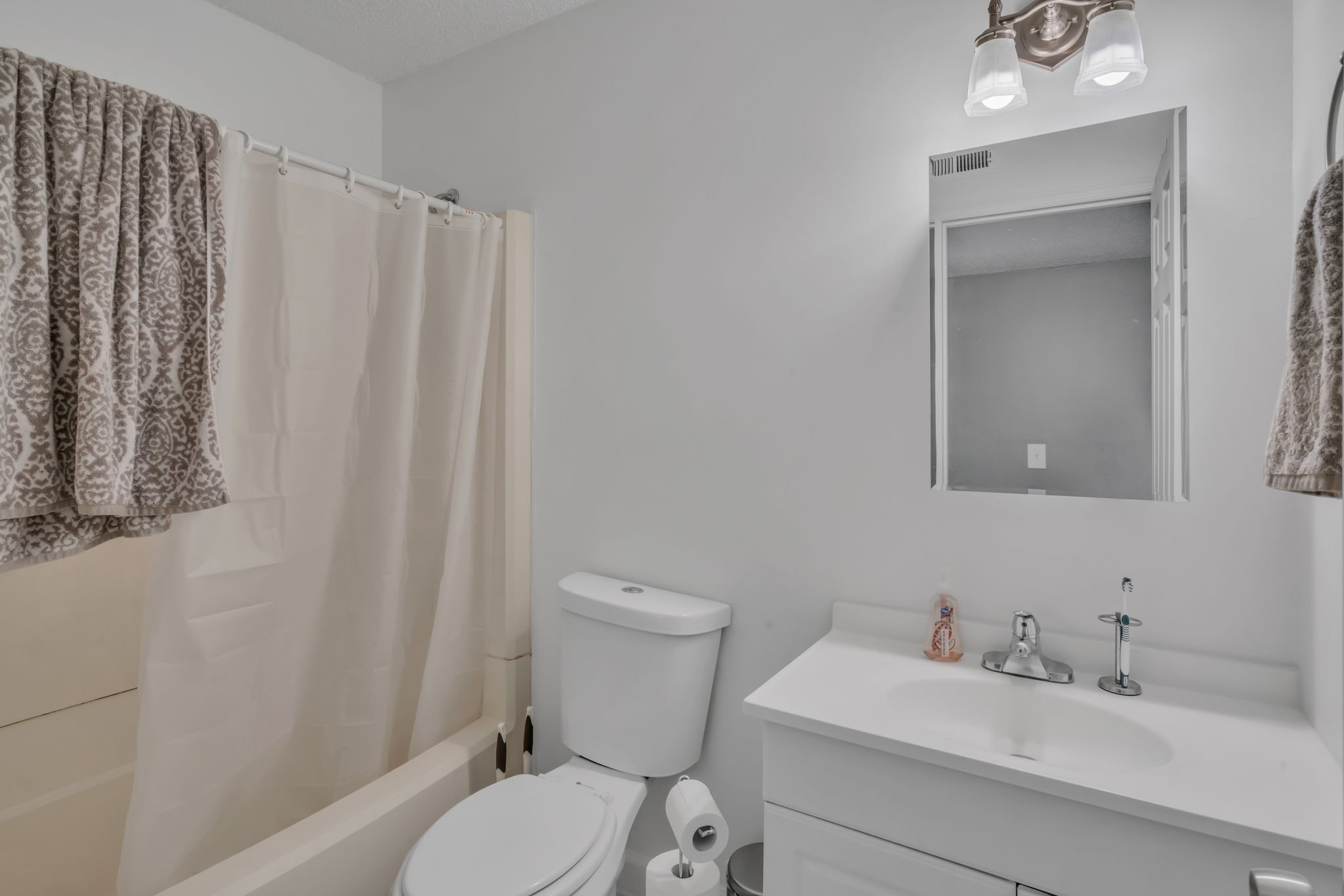 224 Warrior Road Madison, TN 37115 - Photo 12 of 27 a bathroom with a sink toilet and shower
