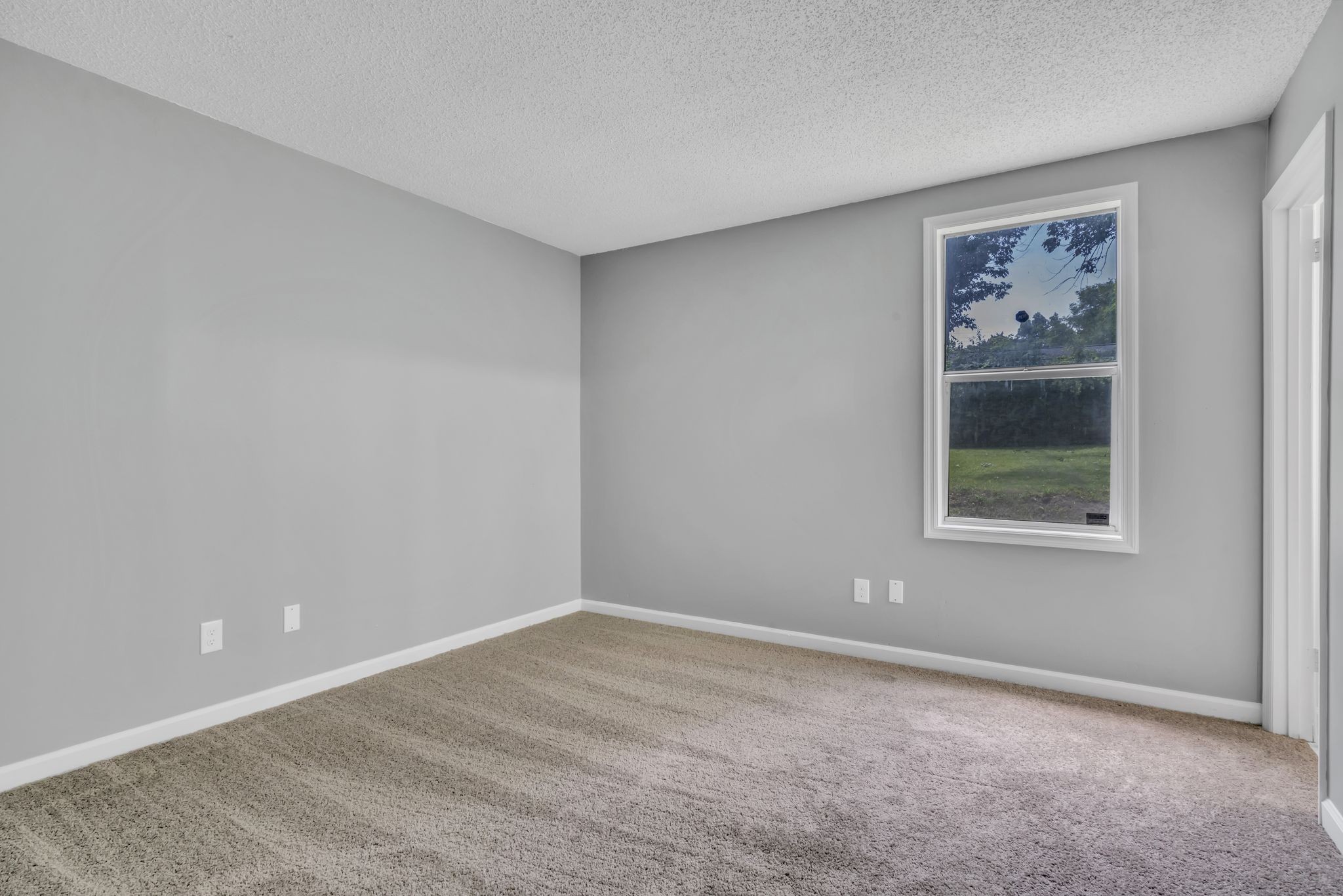 224 Warrior Road Madison, TN 37115 - Photo 13 of 27 a view of an empty room with a window