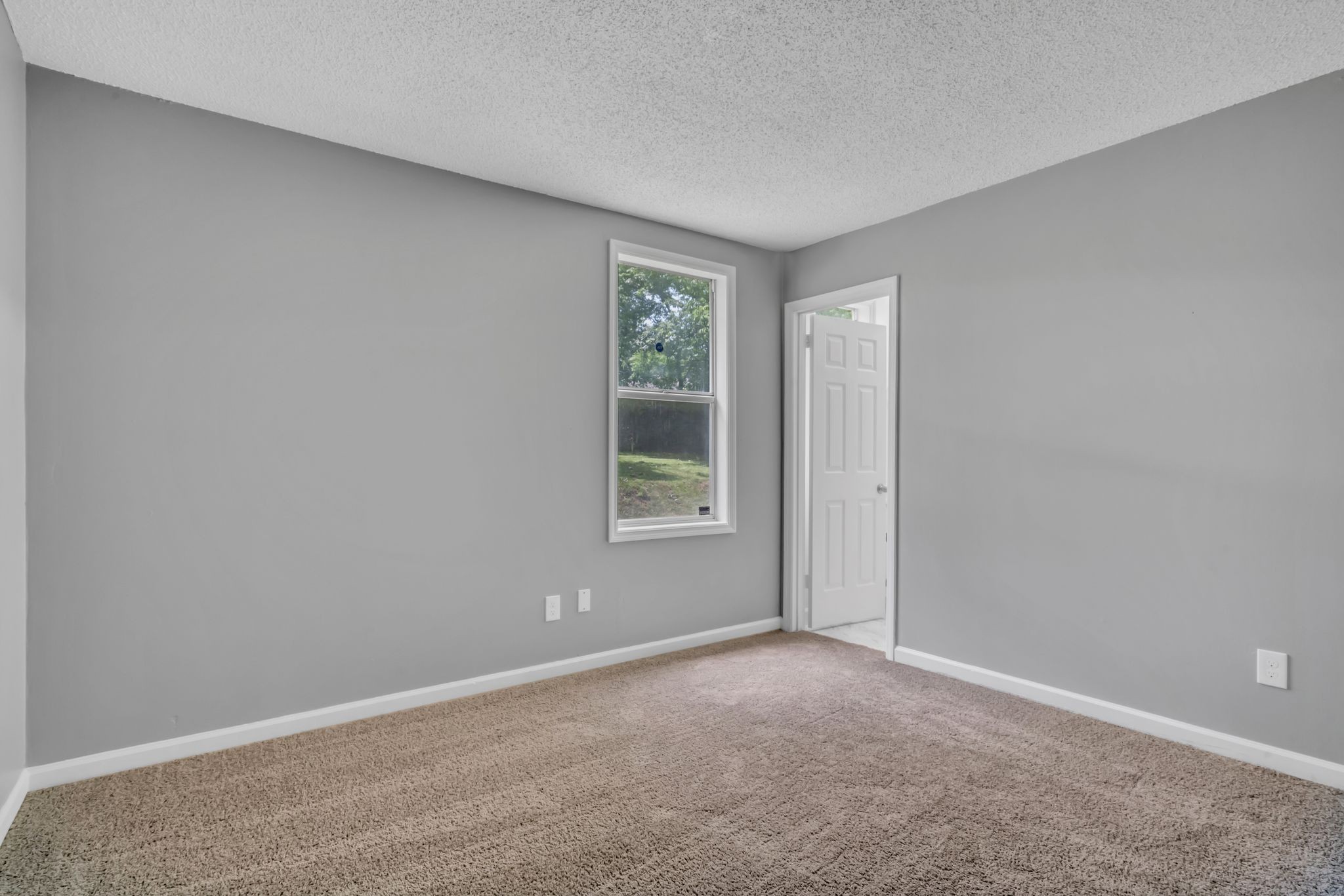 224 Warrior Road Madison, TN 37115 - Photo 14 of 27 a view of an empty room with a window