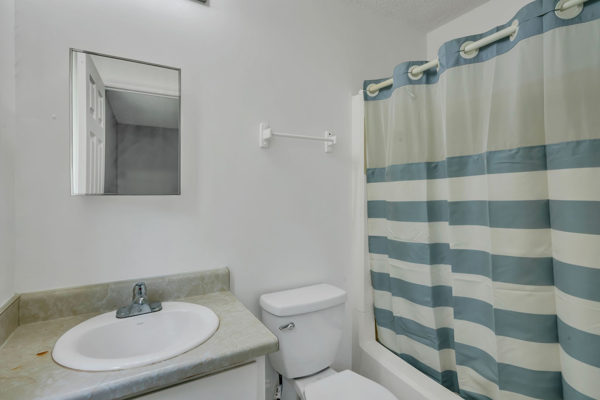 224 Warrior Road Madison, TN 37115 - Photo 17 of 27 a bathroom with a sink toilet and shower
