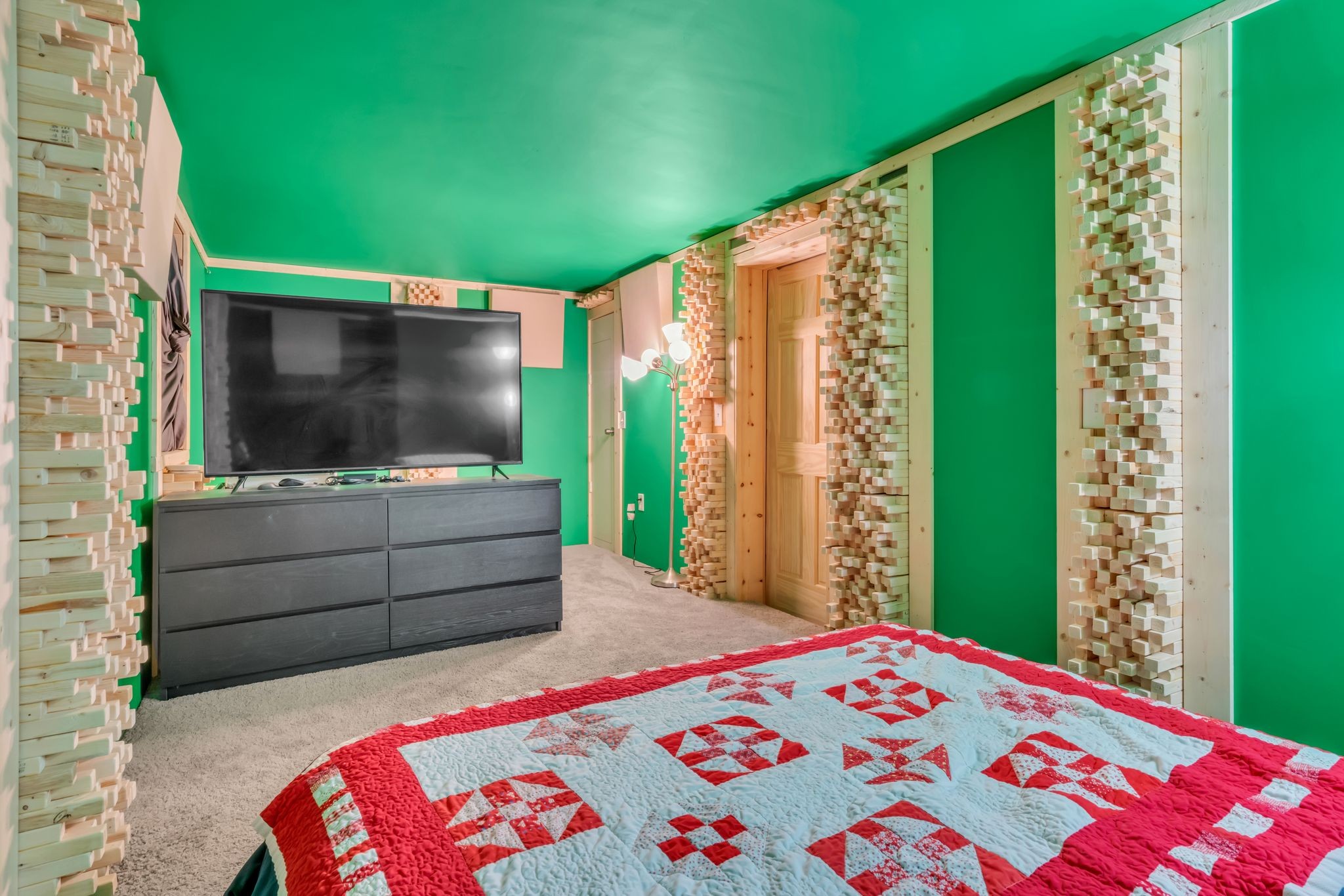 224 Warrior Road Madison, TN 37115 - Photo 20 of 27 a bedroom with a bed and a flat screen tv