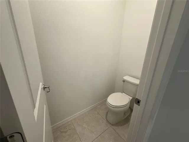 a view of backyard and porch