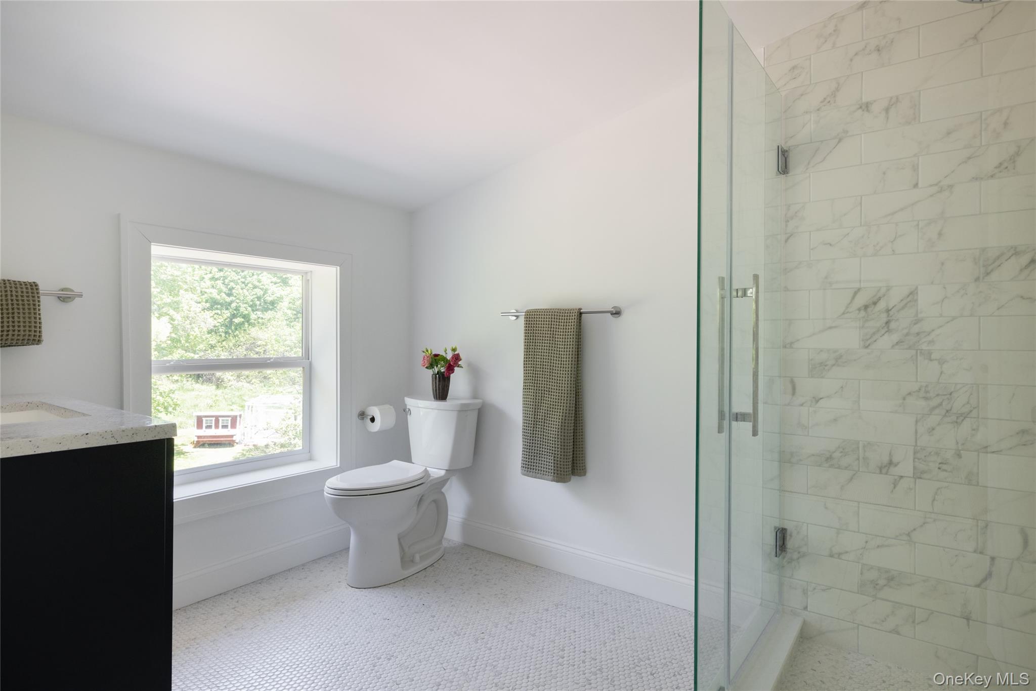 185 Verbank Village Road Millbrook, NY 12545 - Photo 16 of 22 a bathroom with a toilet sink and a window